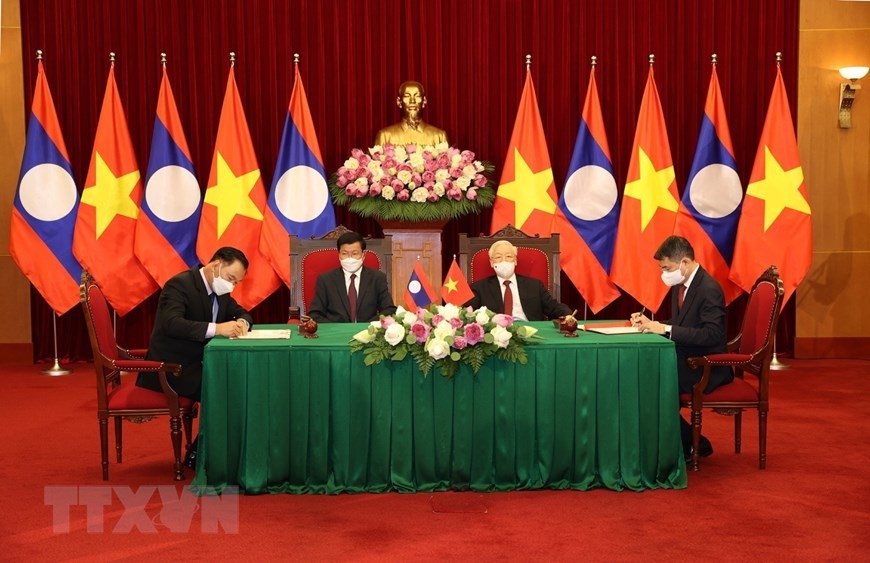 Lễ ký Thỏa thuận hợp tác giữa hai Văn phòng Trung ương của hai Đảng giai đoạn 2021-2025. (Nguồn TTXVN)