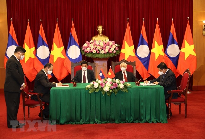 Lễ ký Thỏa thuận về Chiến lược hợp tác giữa Chính phủ nước CHXHCN Việt Nam và Chính phủ nước CHDCND Lào giai đoạn 2021-2030; Hiệp định về hợp tác song phương giữa Chính phủ nước CHXHCN Việt Nam và Chính phủ nước CHDCND Lào giai đoạn 2021-2025; Thỏa thuận hợp tác giữa Bộ Kế hoạch và Đầu tư Việt Nam và Bộ Kế hoạch và Đầu tư Lào giữa Chính phủ nước CHXHCN Việt Nam và Chính phủ nước CHDCND Lào giai đoạn 2021-2023. (Nguồn: TTXVN)