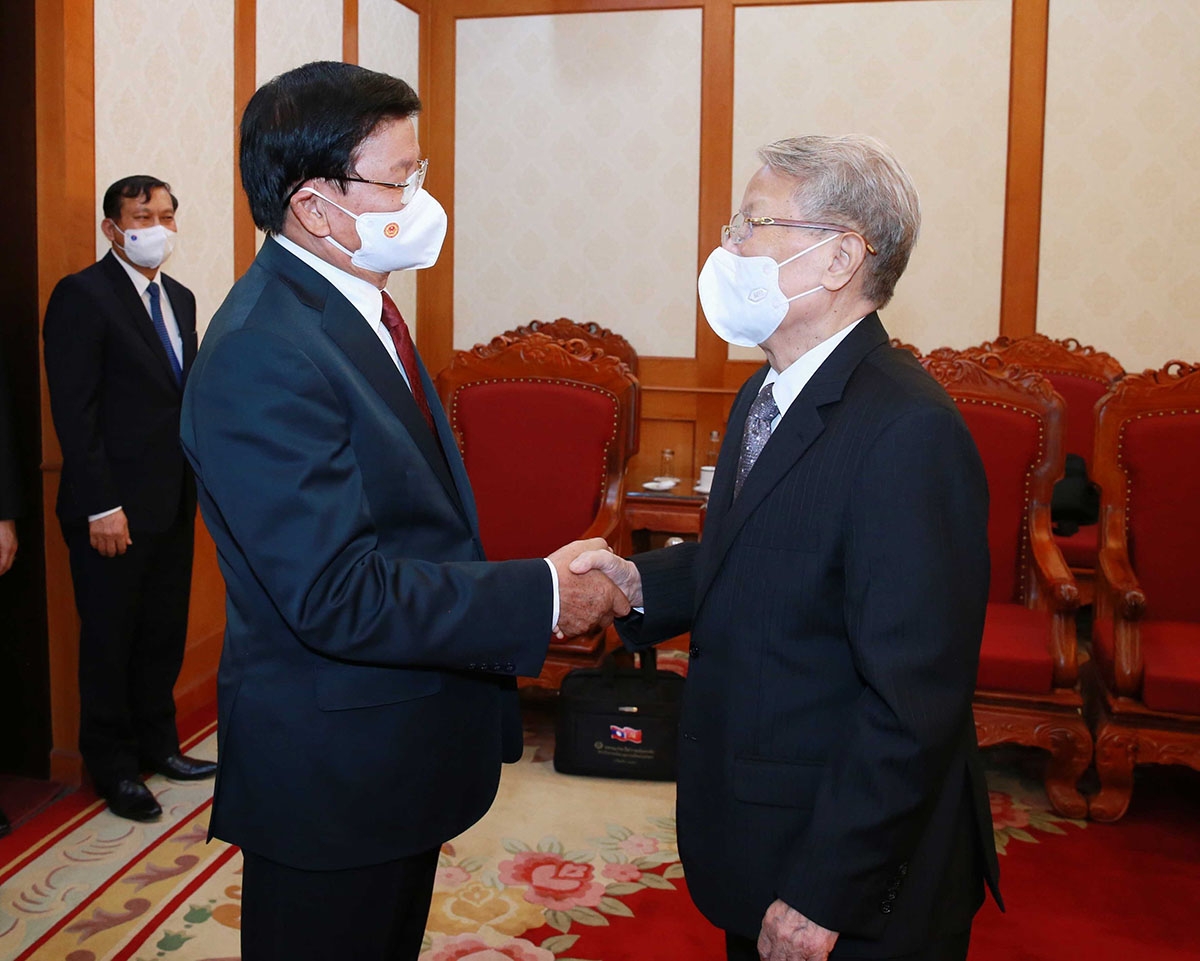Tổng Bí thư, Chủ tịch nước Lào gặp nguyên Tổng Bí thư Nông Đức Mạnh và nguyên Chủ tịch nước Trần Đức Lương