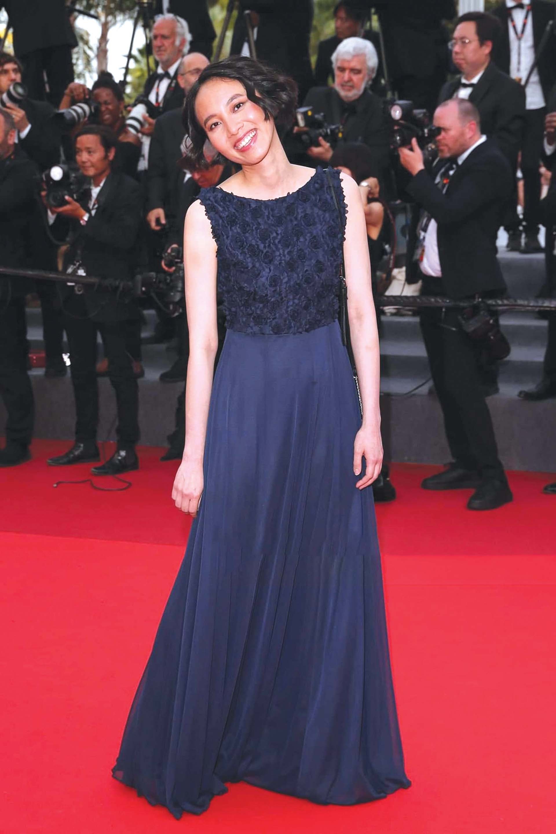 Nữ đạo diễn Mai Vũ tại thảm đỏ Cannes 2022. (Nguồn: Getty Images)