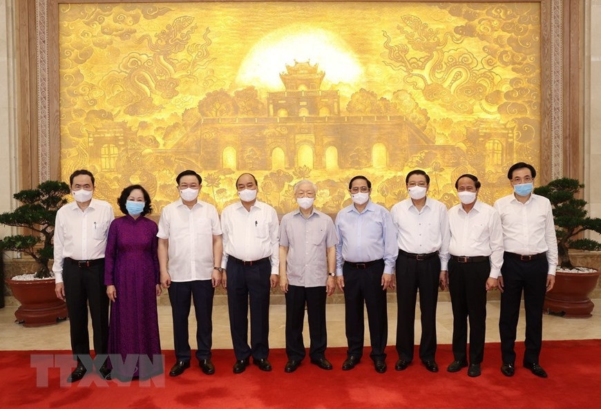 Các vị lãnh đạo Đảng, Nhà nước và các đại biểu dự Phiên họp. (Nguồn: TTXVN)