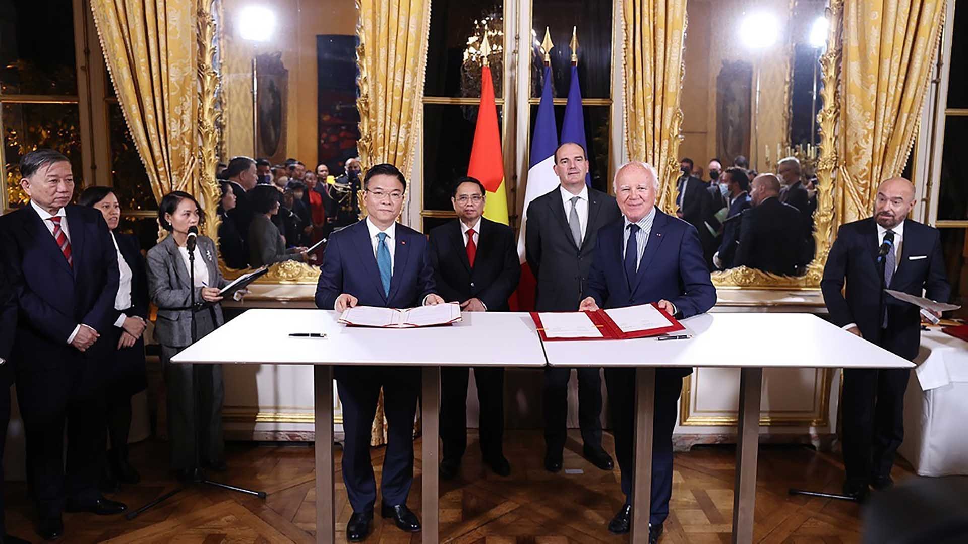 Lễ ký Thỏa thuận hợp tác giữa Bộ Tư pháp Việt Nam và Tham Chính viện Cộng hòa Pháp giai đoạn 2021 - 2026. (Nguồn: TTXVN)