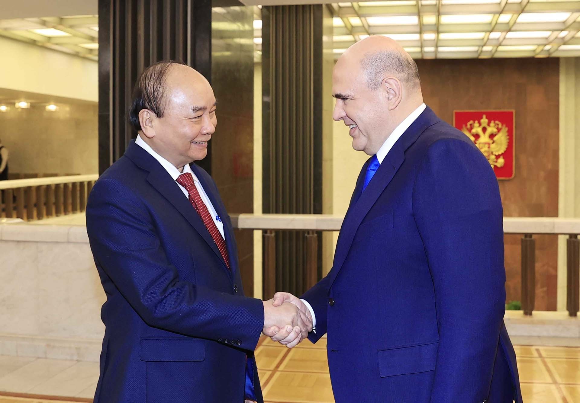 Chủ tịch nước Nguyễn Xuân Phúc và Thủ tướng Liên bang Nga Mikhail Vladimirovich Mishustin. (Nguồn: TTXVN)