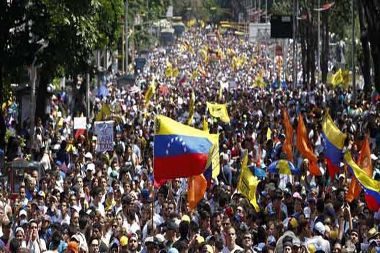venezuela chinh phu va phe doi lap bieu tinh tren ca nuoc