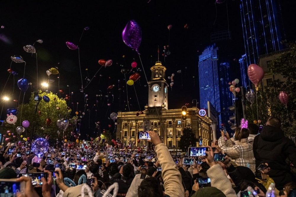 People celebrate the New Year in Wuhan, China. Photo: EPA-EFE