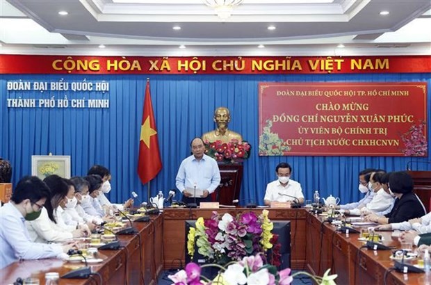 President Nguyen Xuan Phuc speaks at the meeting. (Photo: VNA)