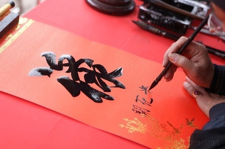 Vietnamese traditional calligraphy during Tet