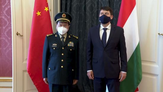 Hungary's President Janos Ader, right, welcomed China's Defense Minister Wei Fenghe to the Sandor Palace in Budapest. (Photo/CGTN)