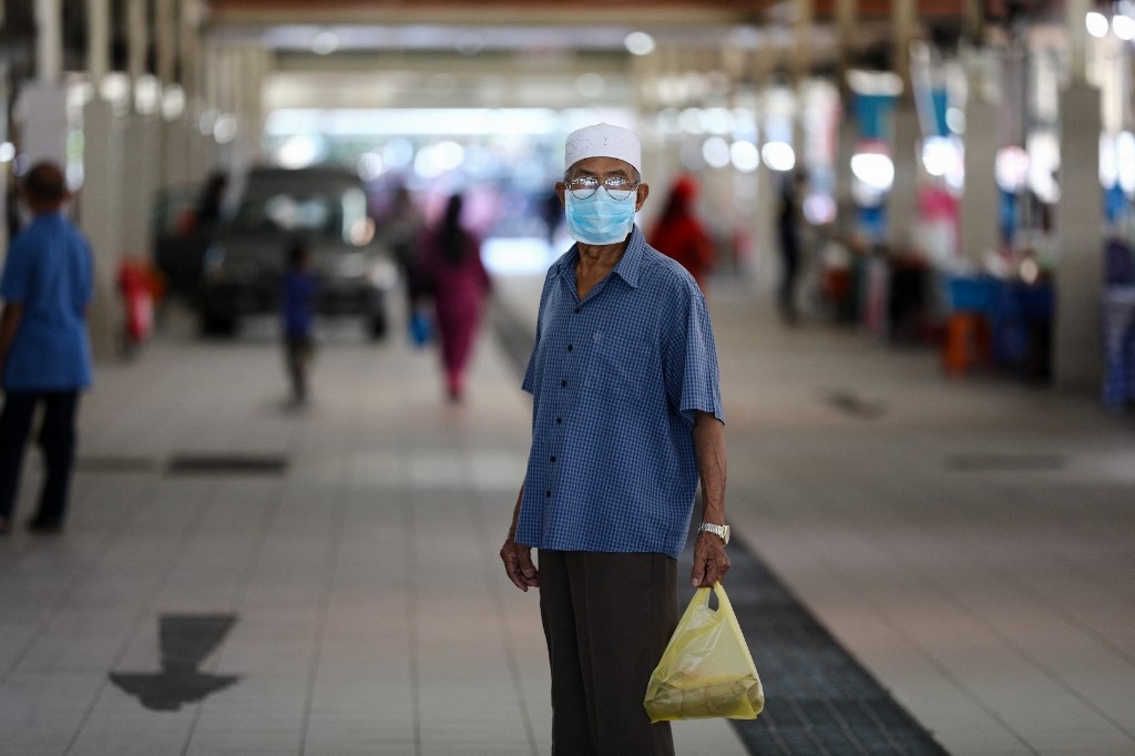 Covid-19: Brunei trở lại biện pháp nghiêm ngặt, Nhật lo hệ thống y tế sụp đổ, Trung Quốc gần 100 ca cộng đồng. (Ảnh: AFP)