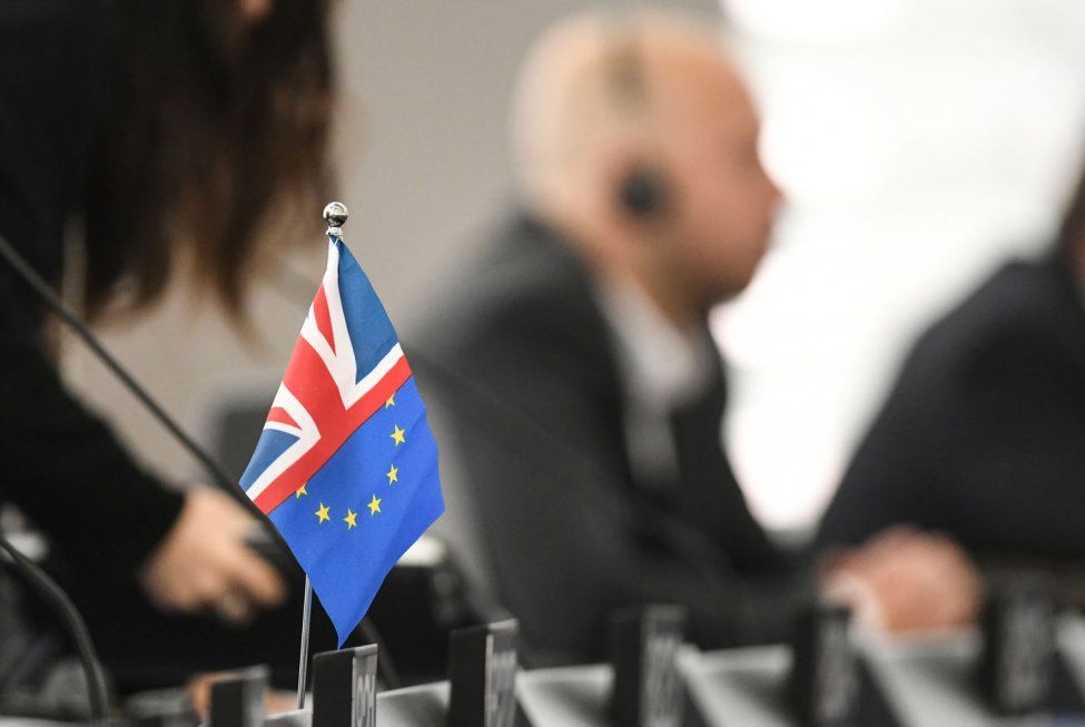 A British-EU flag is seen on a table during Britain's final EU summit at the European Parliament in Strasbourg, France, on October 22, 2019. File Photo by Patrick Seeger/EPA-EFE