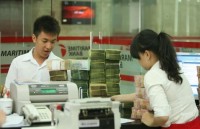 pm nguyen xuan phuc hails vietnam laos banking cooperation