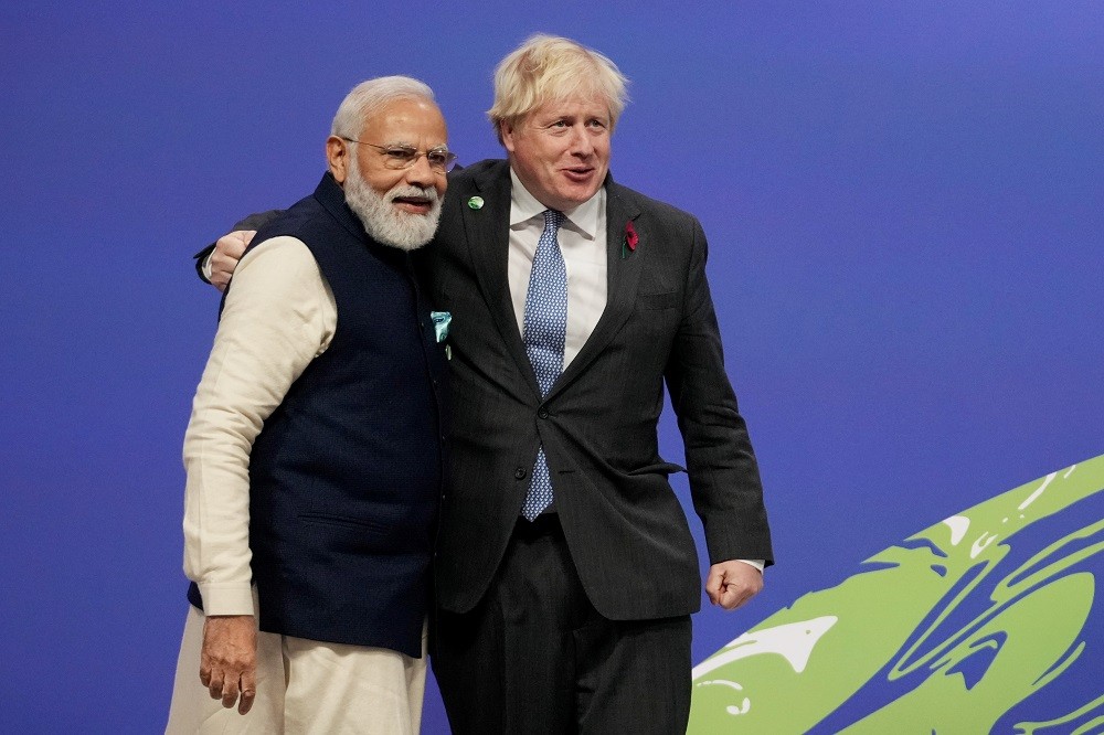 (01.03) Quan hệ Anh-Ấn Độ đã phát triển mạnh thời gian qua - Thủ tướng Anh Boris Johnson và người đồng cấp Ấn Dộ Narendra Modi bên lề Thượng đỉnh COP26. (Nguồn: Reuters)