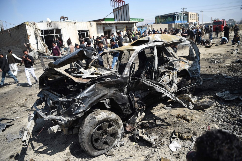 (03.13) Hiện trường vụ đánh bom thảm khốc tại Afghanistan ngày 13/3. (Nguồn: AFP)
