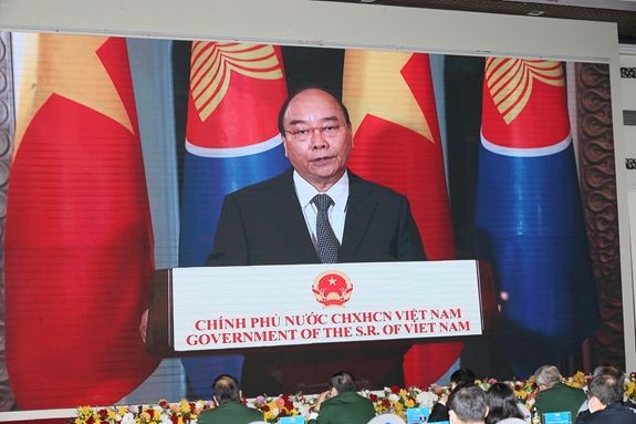 (12.10) Thủ tướng Chính phủ Nguyễn Xuân Phúc phát biểu trực tuyến tại Lễ kỷ niệm. (Nguồn: QĐND)