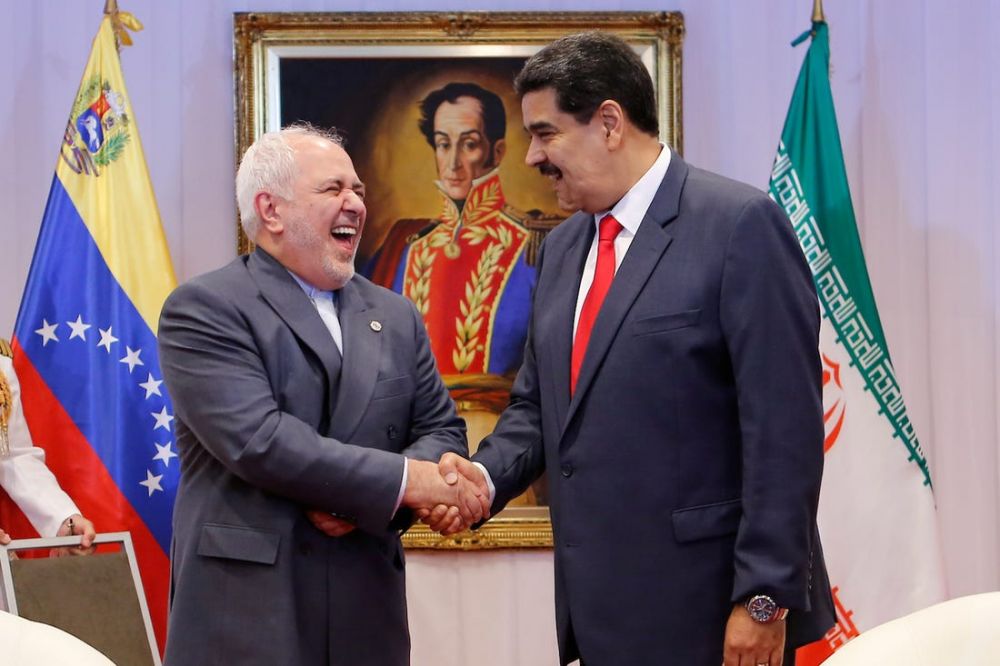(12.20) Ngoại trưởng Iran Mohammad Javad Zarif và Tổng thống Venezuela Nicolas Maduro. (Ảnh: AP)