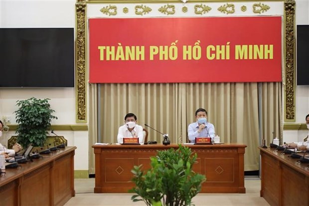 Lãnh đạo UBND TP.Hồ Chí Minh tại cuộc họp Ban Chỉ đạo phòng chống dịch bệnh Covid-19 TP. Hồ Chí Minh chiều 9/2. (Ảnh: TTXVN phát)
