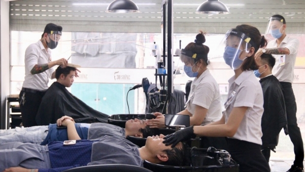 Hanoi allows reopening of indoor eating and drinking venues, hair salons