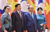 na leader welcomes lao pm in ha noi