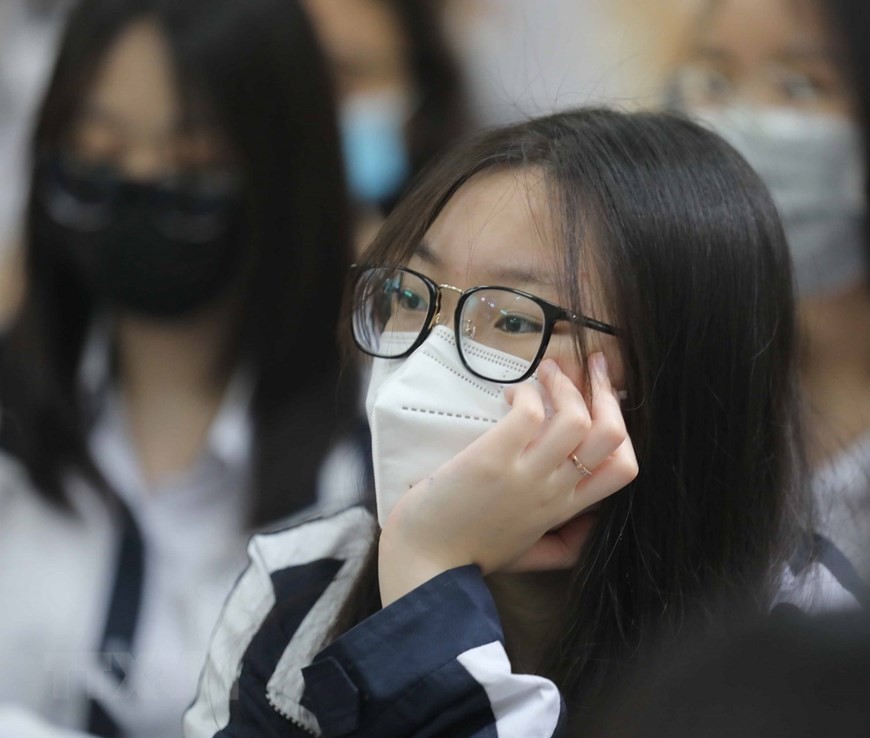 Học sinh Hà Nội đeo khẩu trang phòng chống dịch Covid-19 trong giờ học trực tiếp. (Nguồn: TTXVN)