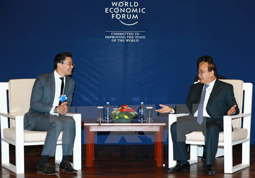 govt chief receives wef aiib cisco leaders