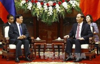 President Tran Dai Quang meets with Lao PM Thongloun Sisoulith