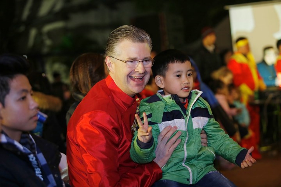 us ambassador his family wear red ao dai to embassy tet event