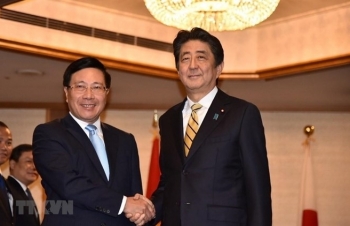 Deputy PM Pham Binh Minh meets Japanese, Lao leaders in Tokyo