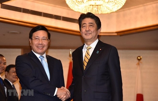 deputy pm pham binh minh meets japanese lao leaders in tokyo