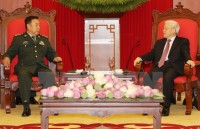 party chief meets with lao front president