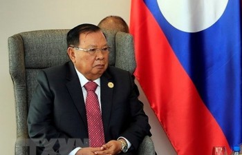 Top Lao leader receives Vietnamese Party officials