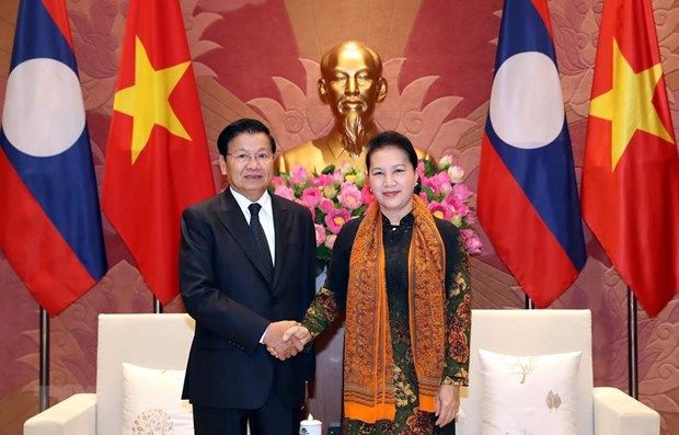 na leader welcomes lao pm in ha noi