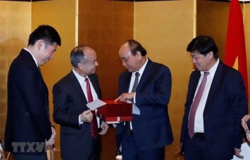 PM welcomes SoftBank’s investment expansion in Vietnam