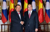 pm chairs meeting with vietnam laos cooperation committee