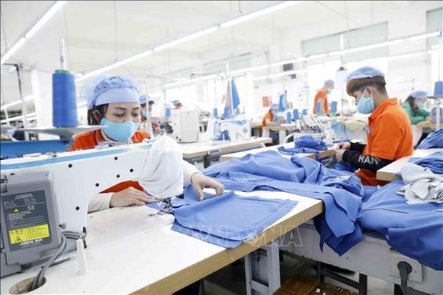 To fulfill the economic growth target of 6.5-7 percent for 2021-2025, the programme is set to ensure rapid recovery and development, as well as safe adaptation to the COVID-19 pandemic in 2022-2023. (Photo: VNA)