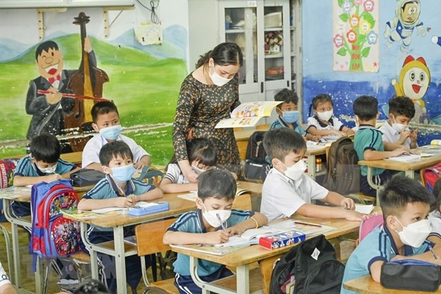 Students at HCM City's Duc Nghia Primary School on the first day of school reopening. (Photo: VNA)