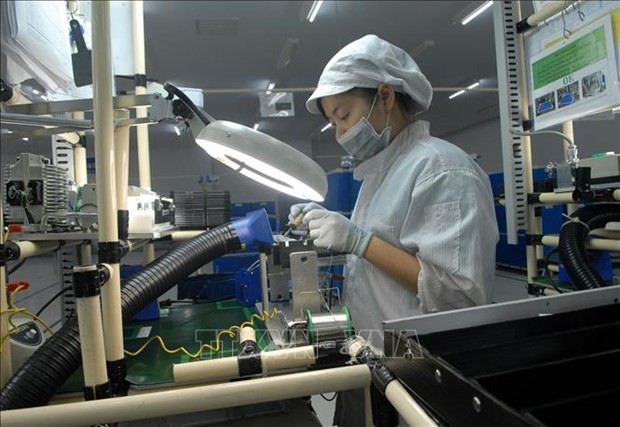 A worker at a production line of a Japanese-invested factory in Vietnam (Photo: VNA)