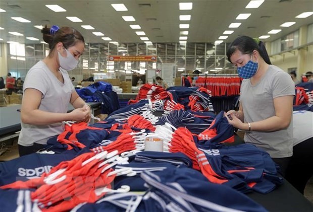 Workers handle garment for export to the EU at a factory in Thai Nguyen province (Photo: VNA)