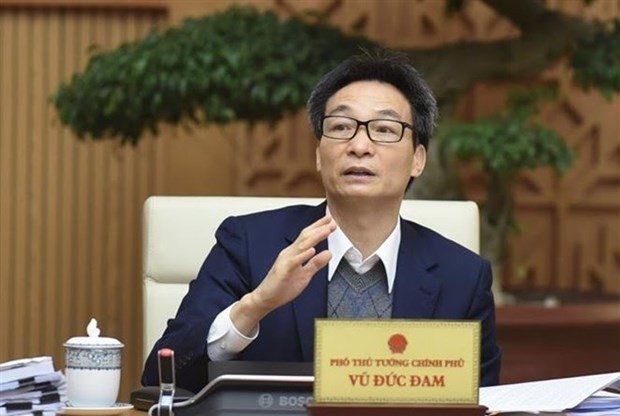 Deputy Prime Minister Vu Duc Dam addresses the meeting (Photo: VNA)