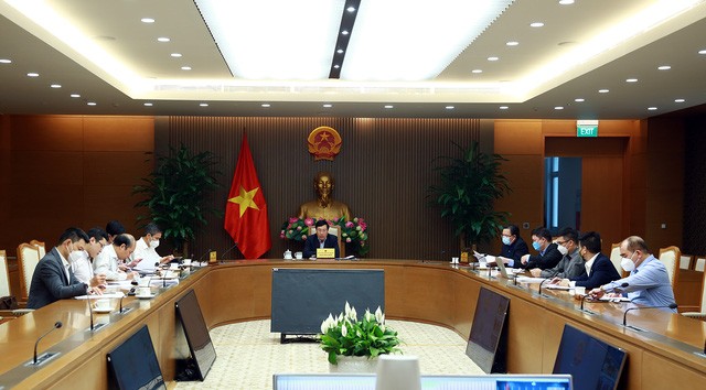 Deputy PM at the teleconference. (Photo: VGP)