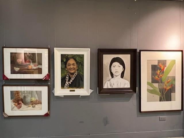 Portraits of outstanding Vietnamese women like heroines Vo Thị Sau (left) and Nguyen Thi Dinh are being displayed at the Women, Country and Love exhibition. Photo courtesy of Đao Lê Hương