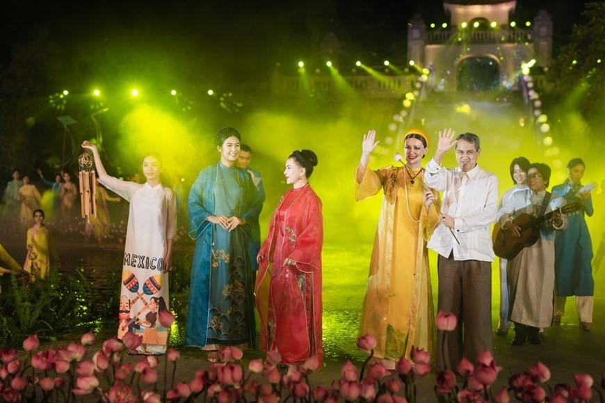 Diplomats and families join ao dai performance