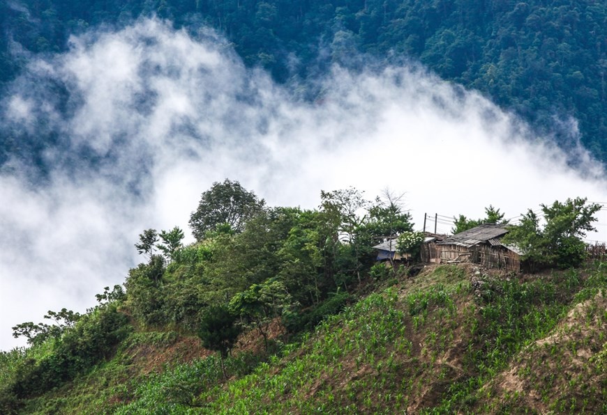 Fluffy white clouds over Khau Pha Pass