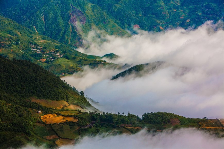 Fluffy white clouds over Khau Pha Pass