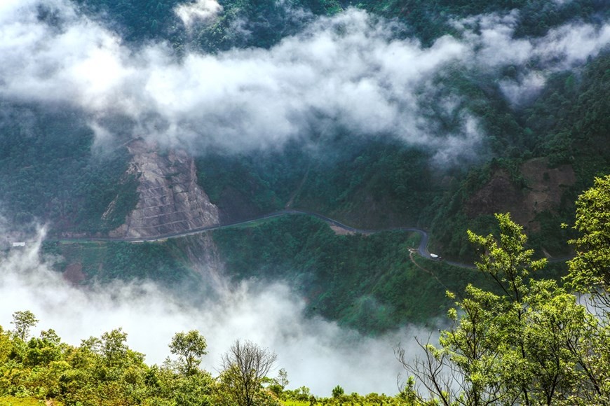 Fluffy white clouds over Khau Pha Pass