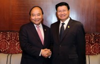 top vietnamese leader welcomes lao prime minister