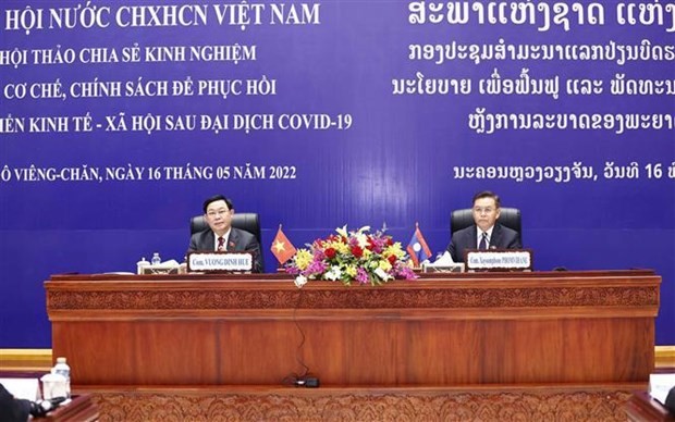 Vietnamese, Lao NAs share experience in designing post-pandemic socio-economic recovery policies