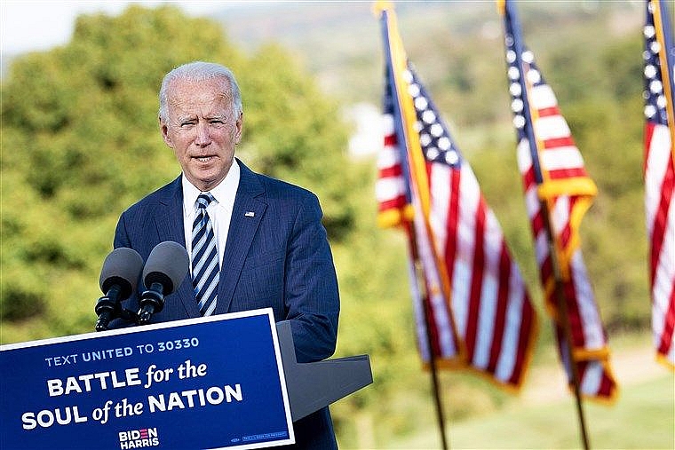 Ông Biden đã đảm nhận những nhiệm vụ cần thiết cho quá trình chuyển giao mà không được hưởng bất kỳ lợi ích nào thường dành cho người chiến thắng. (Nguồn: Getty Images)