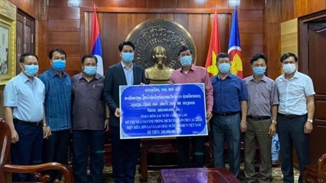 Covid-19: Nhân dân tỉnh Oudomsay, Lào chung tay cùng các địa phương Việt Nam phòng, chống dịch