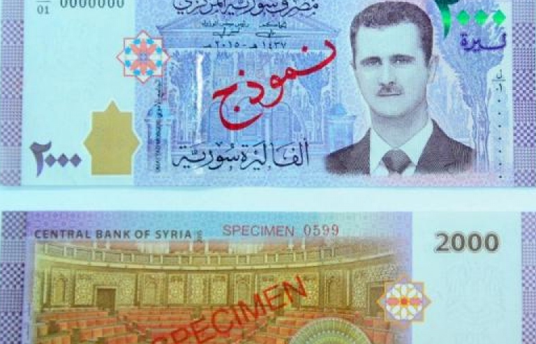 Tổng thống Al-Assad được in hình trên đồng tiền mới của Syria