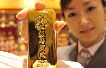 Giá vàng châu Á rời mức “đỉnh” của hơn hai tháng